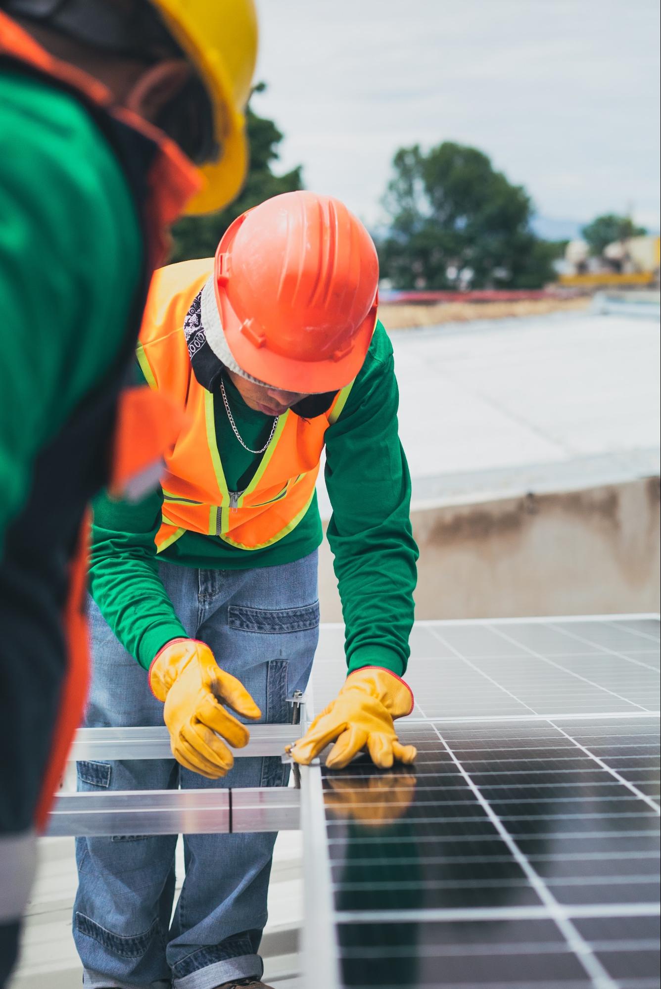 Consultant working on solar panel